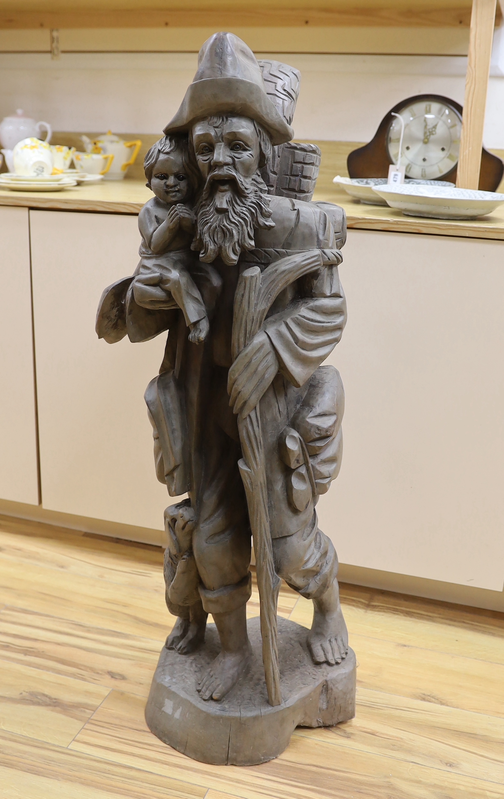 A Tyrolean carved wood figure of St Christopher, 102cm high